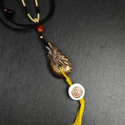 Amulet, Dragon Charm Pendant - Tibetan Buddhist amulet, front view