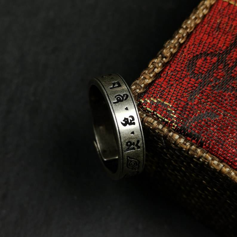Silver Ring - Tibetan Buddhist art, close-up detail