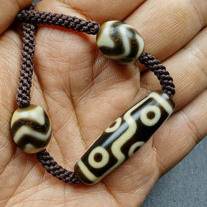 Tibetan Dzi Necklace,9 Eyes Dzi + 2 Wave Darlo Dzi Beads Amulet - Tibetan Buddhist bead necklace, detailed view