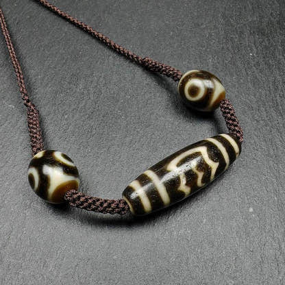 Tibetan Dzi Necklace - Garuda Dzi + 3 Eyes Dalo Dzi Amulet - Tibetan Buddhist bead necklace, front view