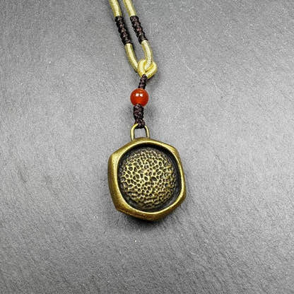 Double Faced Drashi Lhamo Amulet,Zashi Lhamo Pendant - Tibetan Buddhist amulet, detailed view