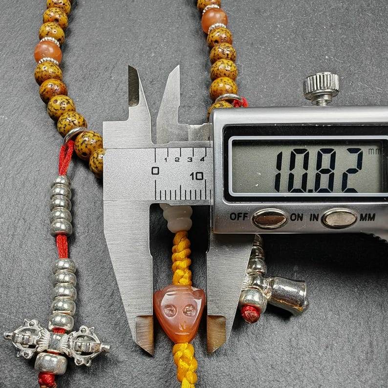 Gandhanra Authentic Tibetan Handhold Wrist Mala - 7.7mm Old Lotus Seed Beads Bra - Tibetan Buddhist mala beads, size reference
