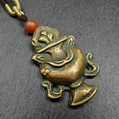 Lima Brass Amulet,Treasure Vase Badge - Tibetan Buddhist amulet, close-up detail