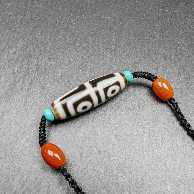 4 Eyes Dzi Bead Necklace - Tibetan Buddhist bead necklace, close-up detail