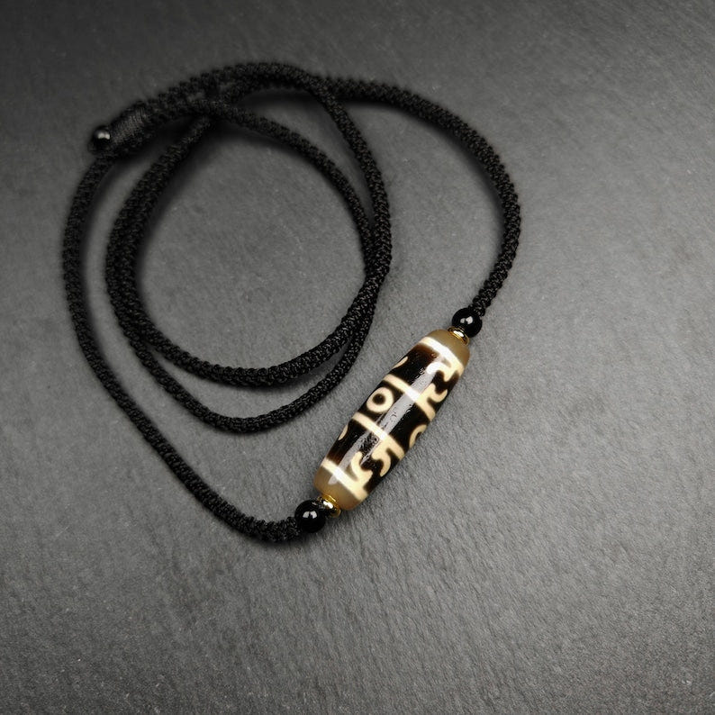Tibetan Guru Rinpoche Three Realms Dzi Bead Amulet,38 - Tibetan dzi bead, detailed view
