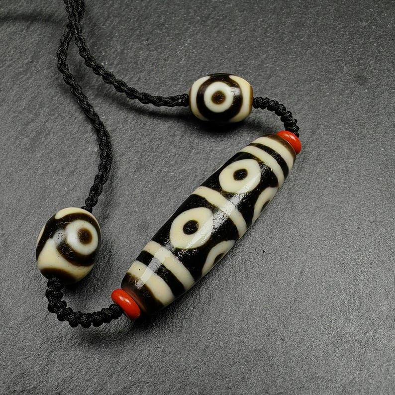 8 Eyes Dzi + Mandala 3 eyes Dzi Beads Amulet - Tibetan dzi bead, close-up detail