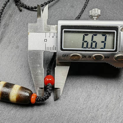 Stripe Dzi Bead Amulet - Tibetan dzi bead, size reference