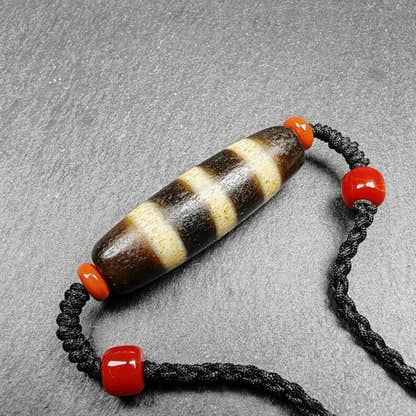 Stripe Dzi Bead Amulet - Tibetan dzi bead, detailed view