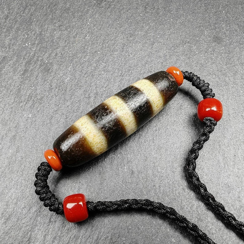 Stripe Dzi Bead Amulet - Tibetan dzi bead, front view