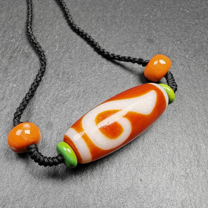 Dzi Necklace - Tibetan Buddhist bead necklace, front view