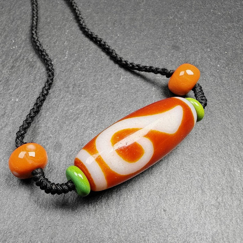 Dzi Necklace - Tibetan Buddhist bead necklace, front view