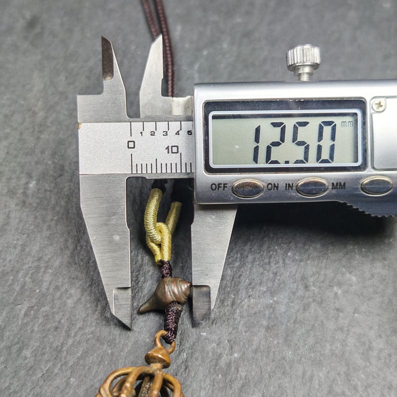 Tibetan Vajra Amulet - Protective Charm - 47 - Tibetan Buddhist amulet, size reference