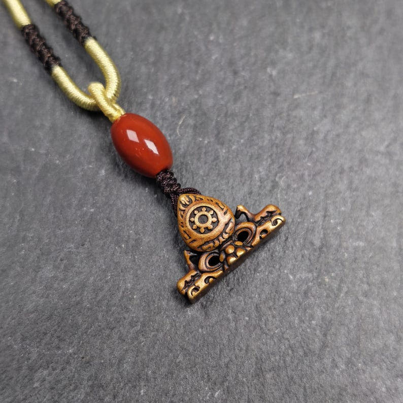 Deer & Dharma Wheel Pendant - 20mm - Tibetan Buddhist amulet, detailed view