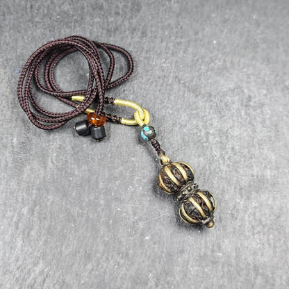 Vajra Amulet Tibetan Protective Charm with Consecration Filled 35*15mm - Tibetan Buddhist amulet, close-up detail