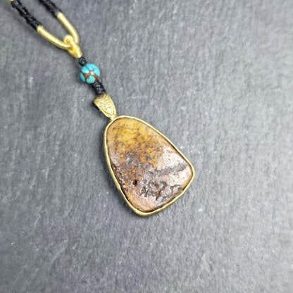 Shield-shaped Kapala Amulet - 33mm - Tibetan Buddhist amulet, front view