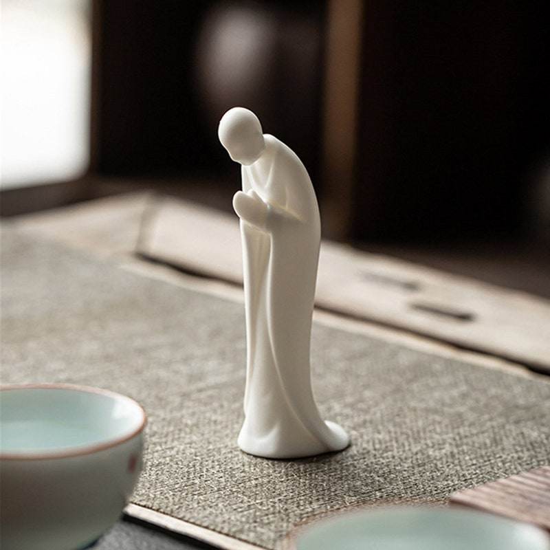 White Porcelain Meditation Buddha Statues - Tibetan Buddhist statue, close-up detail