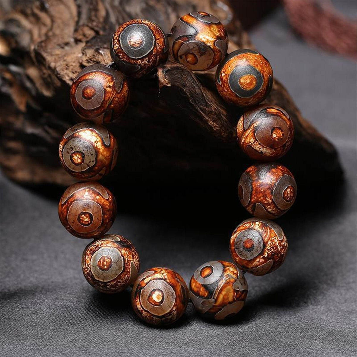 3 Eyes Dzi Bead Bracelet - Tibetan Buddhist mala beads, detailed view