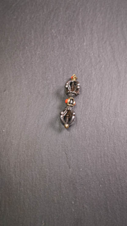 This unique vajra pendant was handmade by Tibetan craftsmen from Tibet in 1990's,from Hepo Town, Baiyu County, the birthplace of the famous Tibetan handicrafts. It is five-pronged Vajra,made of cold iron, 1.77 inch height.Comes with leather cord. You can make it a necklace, pendant, keychain, mala pendant, or just as an ornament on your desk.