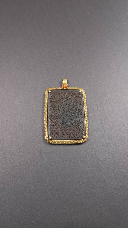 This badge is made by Tibetan craftsmen from Hepo Town, Baiyu County, the birthplace of the famous Tibetan handicrafts. It is made of copper, 2.52 × 1.57 inches. The front is the OM mantra and the back is body, speech, and mind.