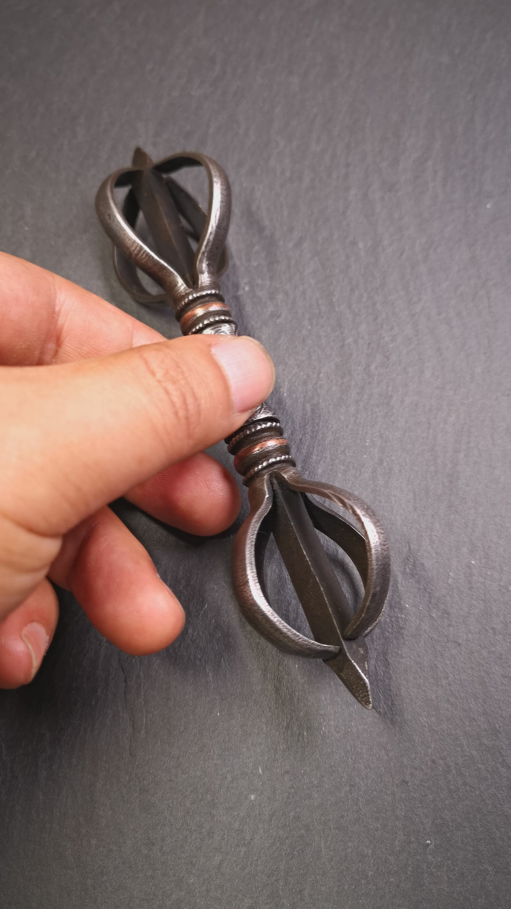 These beautiful vajra were handmade by Tibetan craftsmen from Tibet in 1990's,from Hepo Town, Baiyu County, the birthplace of the famous Tibetan handicrafts. It is five-pronged vajra,made of cold iron,inlaid copper wire,black color.