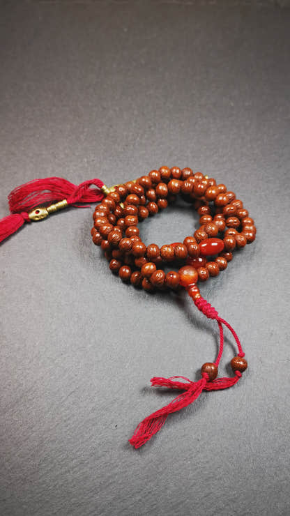 This old mala was collceted from Gerze Tibet.It is composed of 108 Indian jujube beads ,agate beads,and 1 pair of brass bead counters.