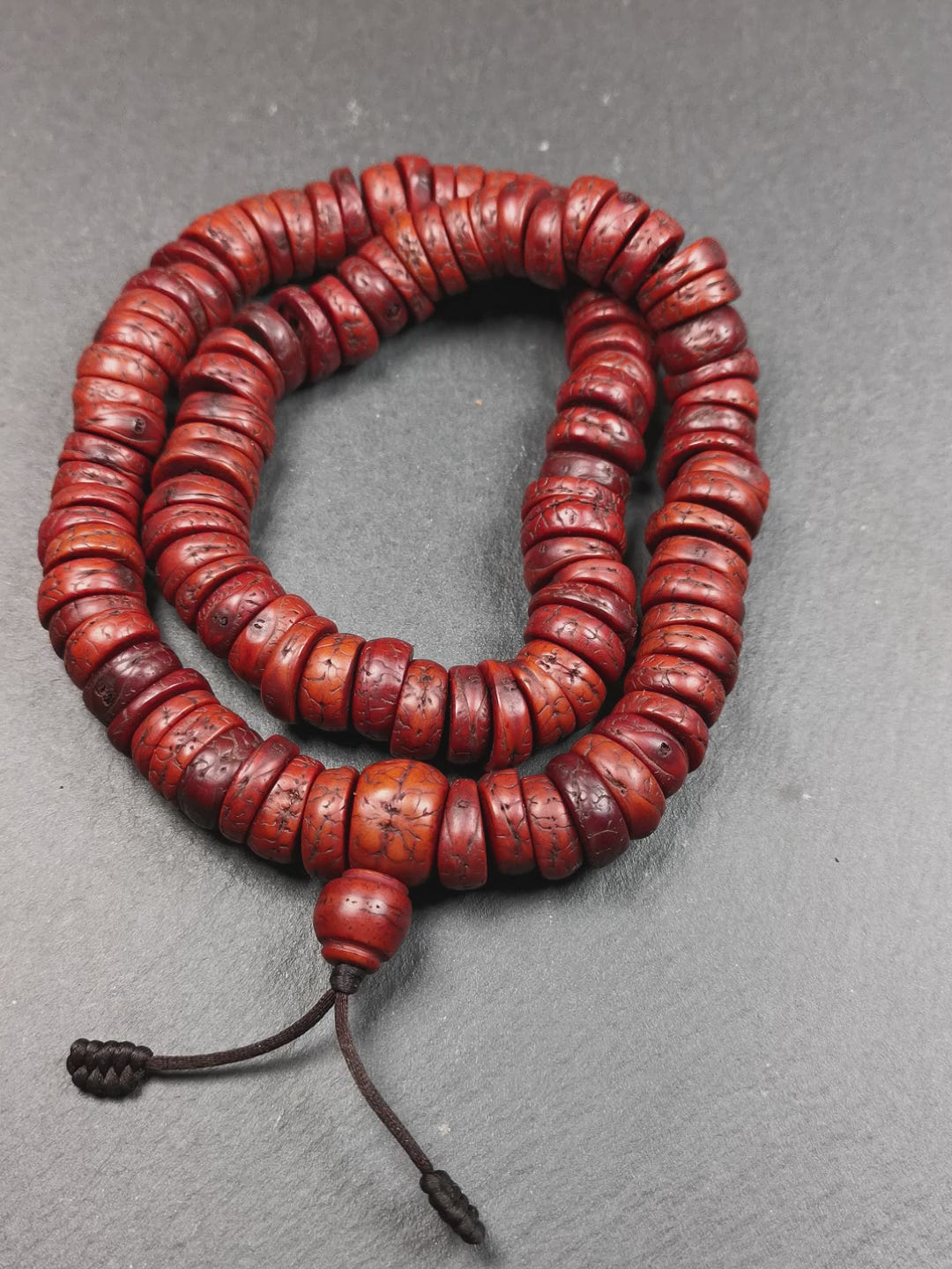 This bodhi bead mala is made by Tibetan craftsmen.  108 bodhi beads approximately 14mm / 0.55 inches,Mala'perimeter is about 44cm,17.3 inches. Each retaining the eye of the bodhi bead,very unique and elegant.
