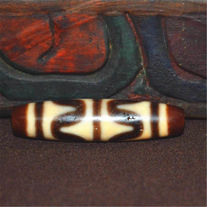 Tiger Tooth Tasso Dzi Bead - Tibetan dzi bead, view 7