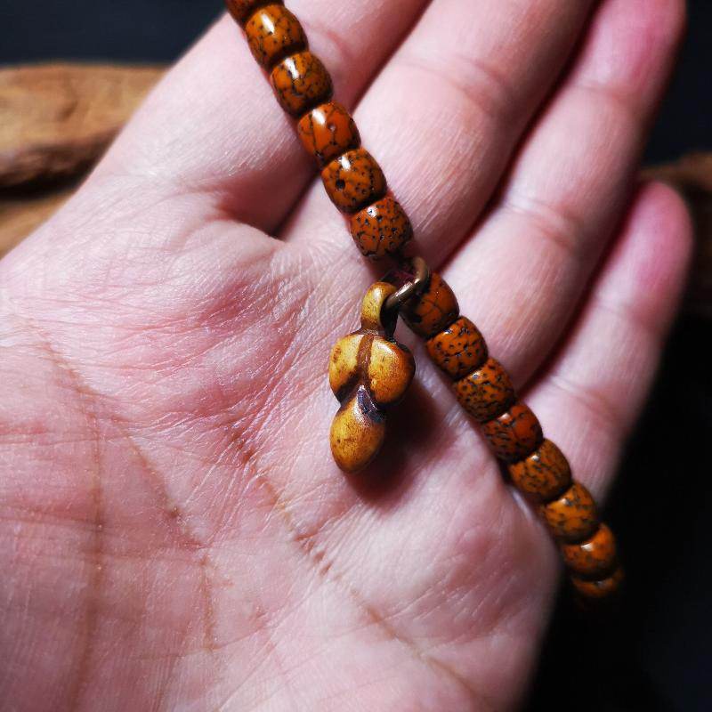 Gandhanra Tibetan Bone Carved Nubro Amulet,Mani Jewel/Wish-Fulfilling Cintamani, - Tibetan Buddhist mala beads, detailed view