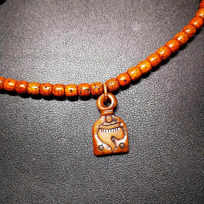 Gandhanra Tibetan Shankha Flower Amulet,Yak Bone Carved Conch Pendant, Bead Coun - Tibetan Buddhist mala beads, close-up detail